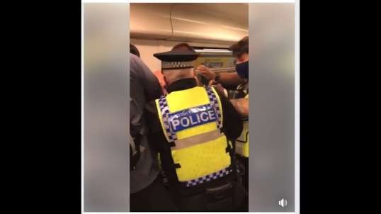 In Britain a man is abused by a copper for not wearing a mask